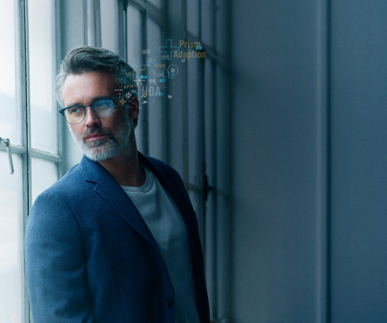 A man wearing glasses with digital eye measurements overlaid above his lenses.