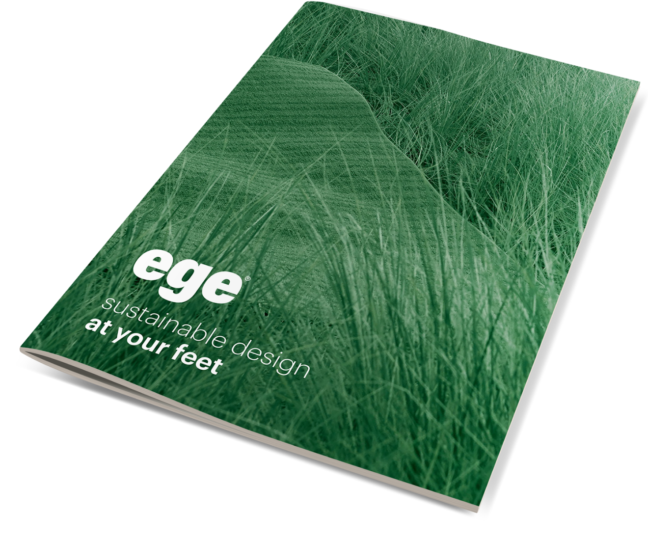 Ege Carpets brochure with a green carpet blending into grass and the tagline “Sustainable design at your feet.”
