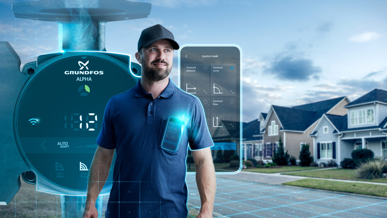 A man with a smartphone in a Grundfos APLHA ad.
