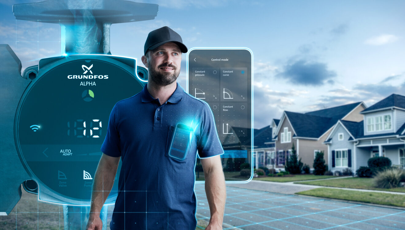 A man with a smartphone in a Grundfos APLHA ad.