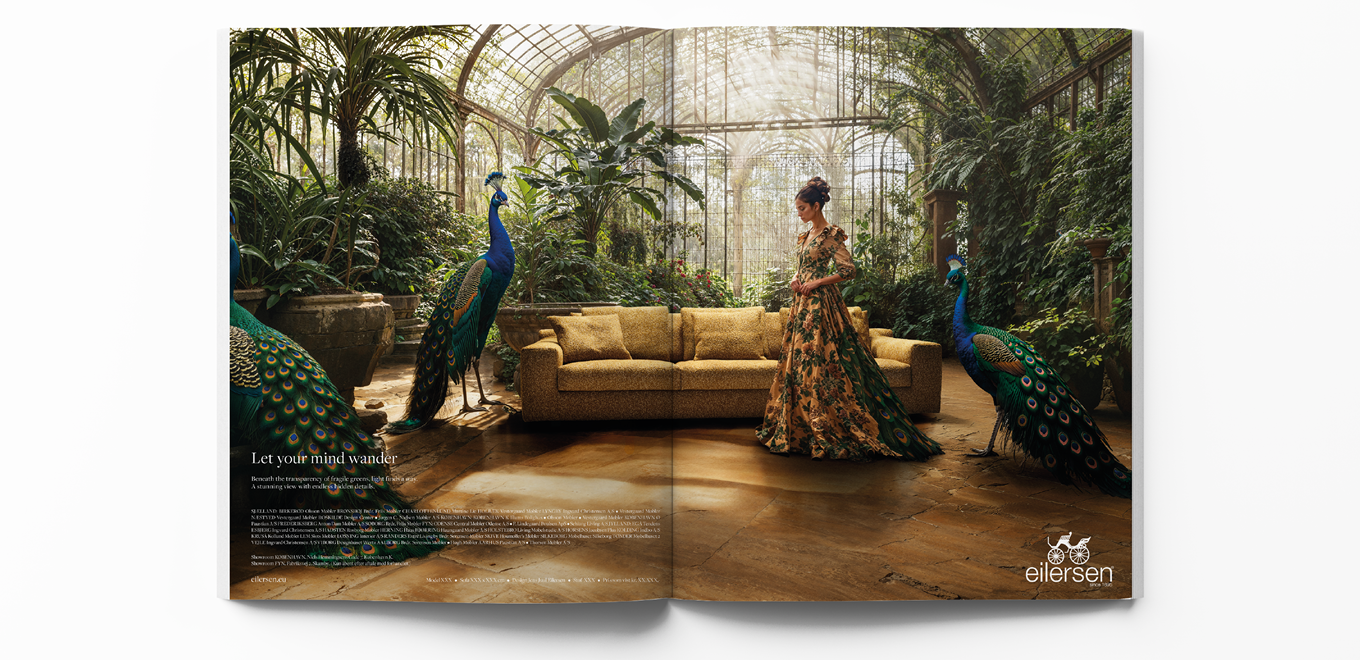 Eilersen magazine with a sofa, a woman and peacocks.