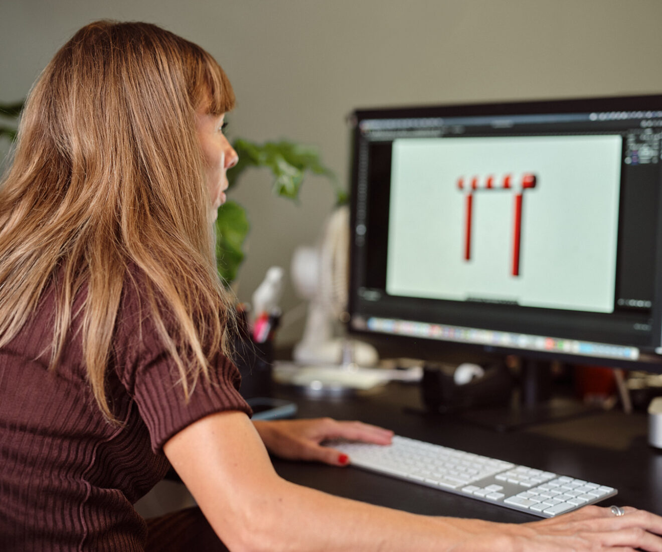 An employee working at her desk.